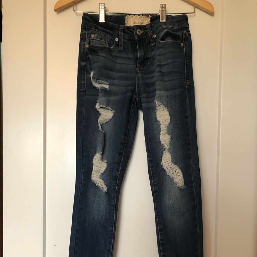 Altered state feathered/ripped jeans - raw hem.